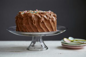 chocolate cake on glass platter